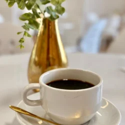 Black coffee in white cup