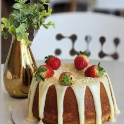 get in touch (1) Bundt cake with glaze and berries
